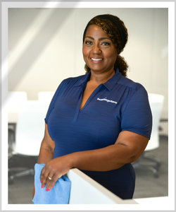 A Buildingstars cleaning franchise owner holds a microfiber rag. She is prepared to help keep your facility healthy!
